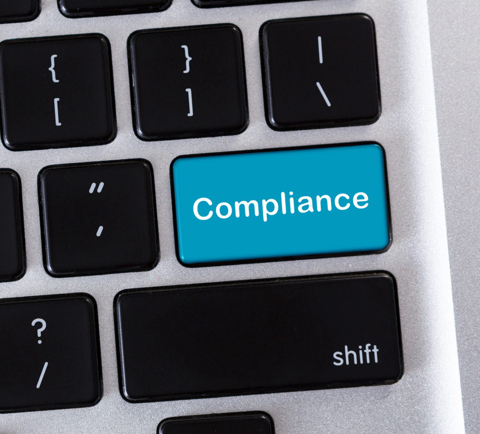 Compliance Keyboard key to represent Corporate Compliance and Investigations